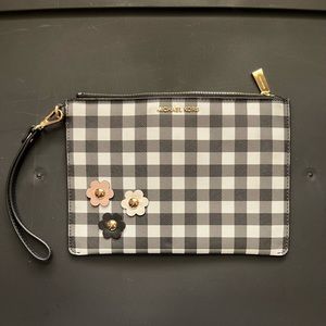 Michael Kors black and white plaid wristlet with studded floral